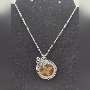 Upcycled Louis Vuitton Necklace In The Color Antique Silver With Bow Charm